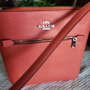 Coach Rowan file bag in leather. Like new condition. 9.75”L, 10.25 H, 1.5”W